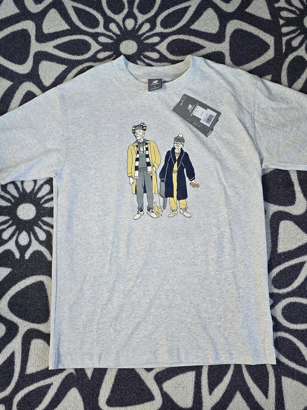 New Balance Men’s Light Gray Graphic Tee with Yellow & Navy Illustration